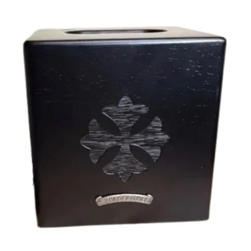 Chrome Hearts silver‑accented tissue box is custom‑crafted from North American black walnut, with a solid‑wood body and no seams. It features a lid-and-base design and four pairs of magnets for a vintage‑style finish