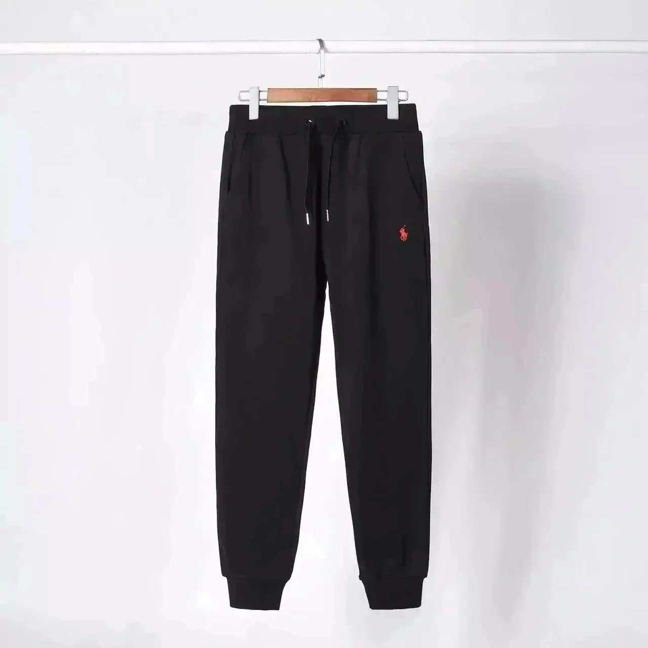 Trousers – Black pants with a red label, M 55-65KG