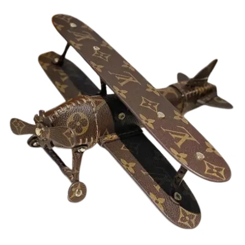 Vintage floral airplane ornament from a streetwear brand, crafted with meticulous hand-stitching. A perfect home decor piece to enhance your living room’s ambiance, complement your refined taste, and showcase artistic flair. Dimensions: 25 × 23 cm