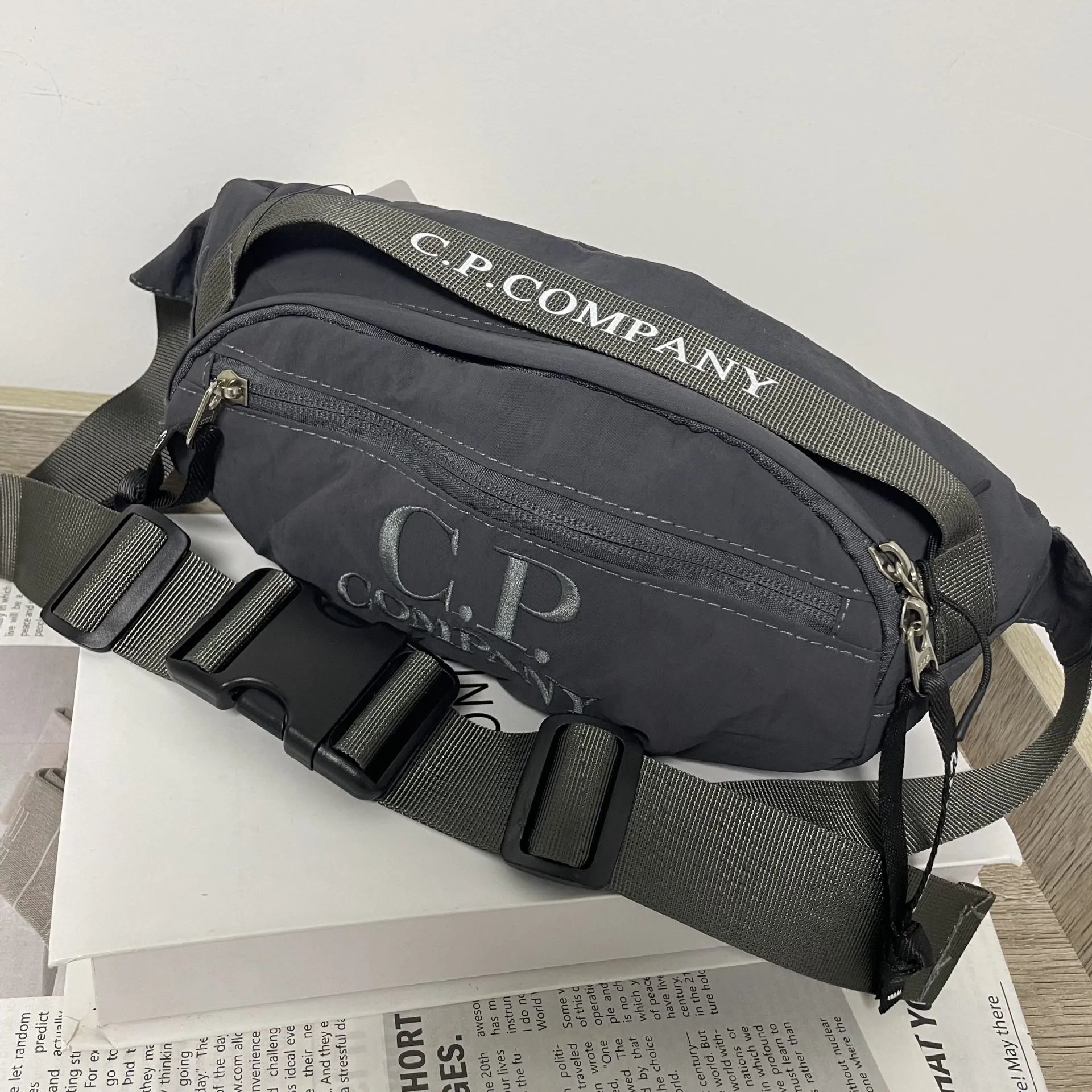 2025 year C.P.COMPANY Embroidery LOGO Men's and women's waist bag portable outdoor sports messenger bag chest bag in stock – Dark gray