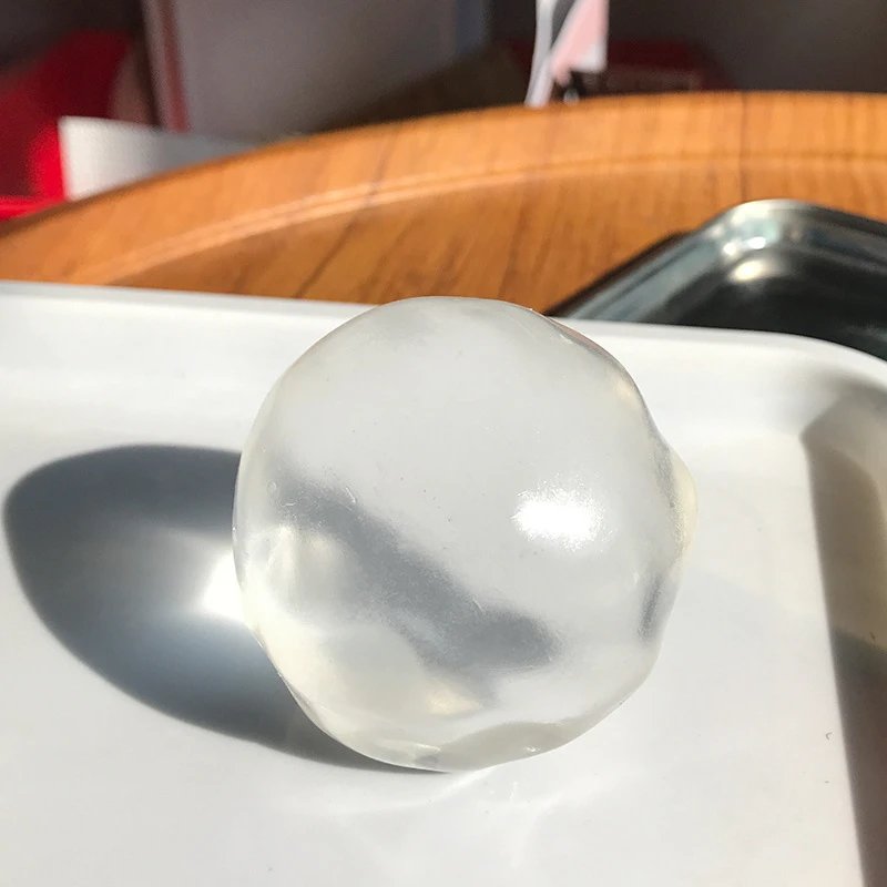 White Moonlight Coconut Oil Squeeze Ball, same style as on Xiaohongshu—highly translucent, super moldable, stress-relief toy ball, creative sphere – feel very good not maltose